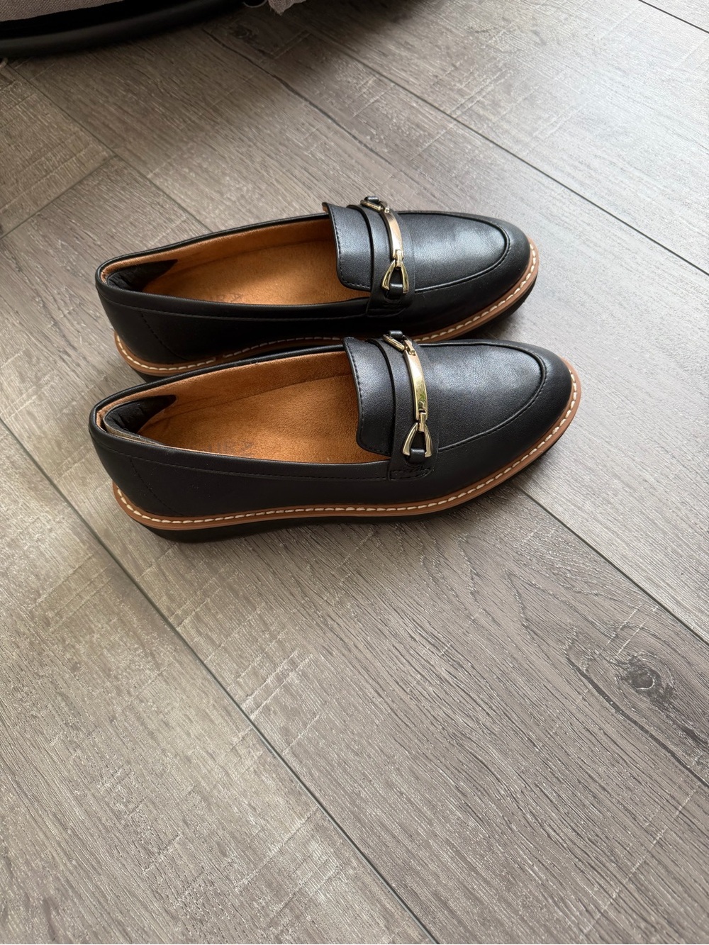 Classic Black Women's Loafers with Gold Accent